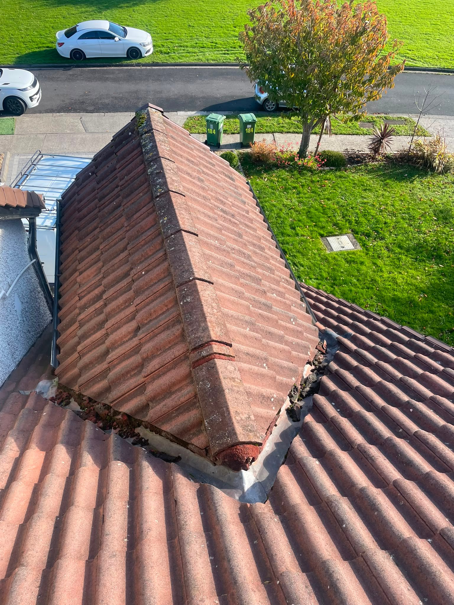 Emergency roof repair on a tile apex roof