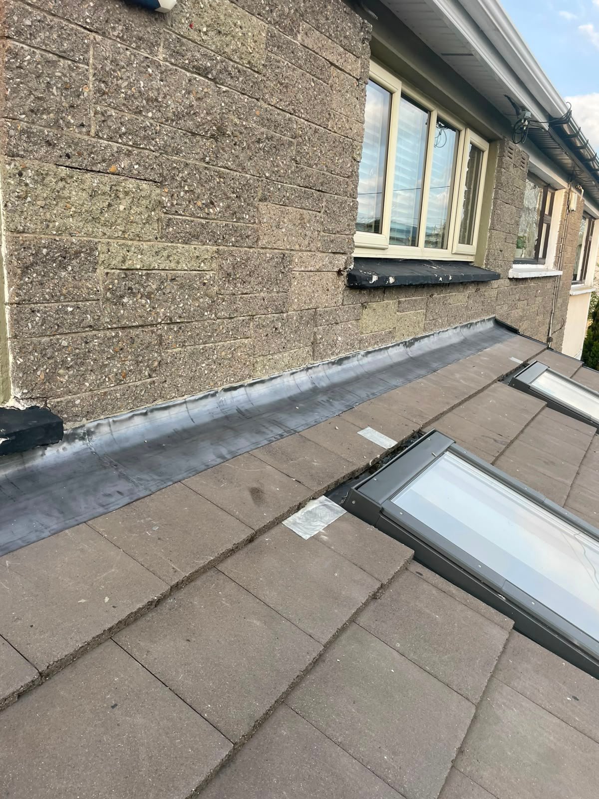 Lead flashing repair for a lean to at back of a home in meath