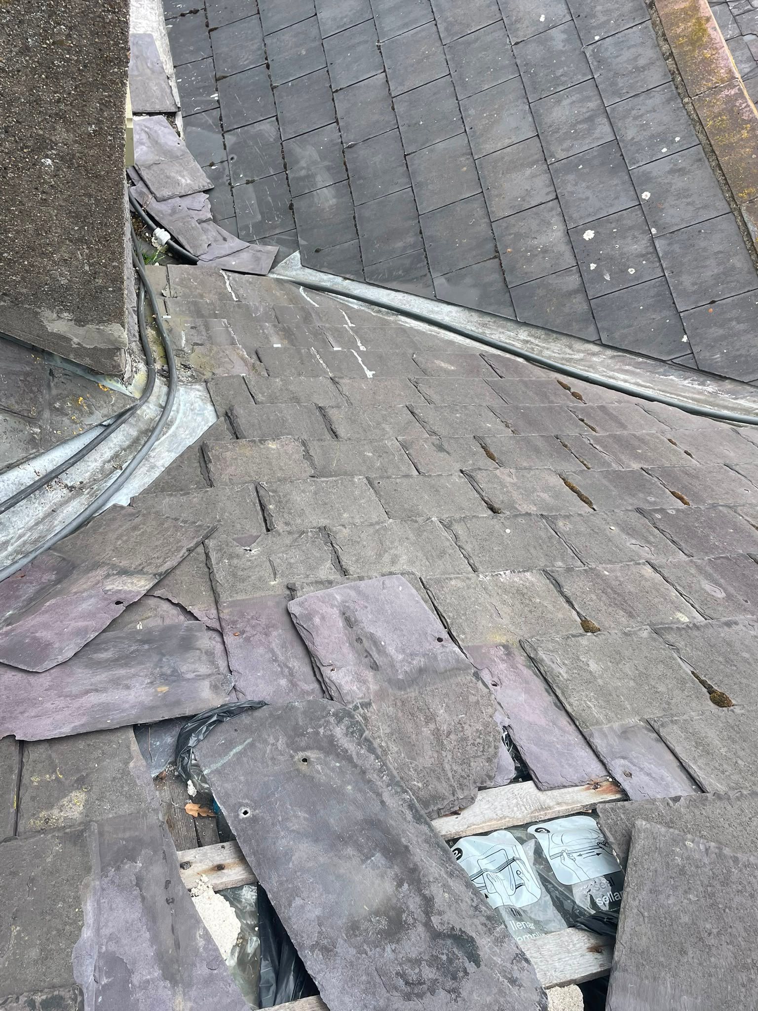 Slate roof repairs that were needed because of leak into the home in Meath